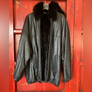 Black leather reversible coat. Ferrara collection size women’s Large.